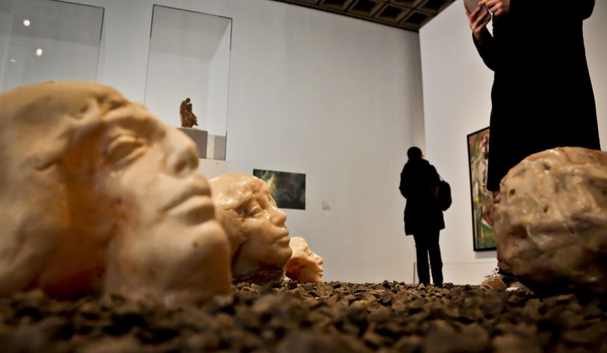 Unfinished marble sculptures from French sculptor Auguste Rodin is unveiled, during a press preview for the inaugural programming of The Met Breuer museum, Tuesday, March 1, 2016, in New York. The Metropolitan Museum of Art throws open the doors March 18, 2016 to its new modern and contemporary art outpost, The Met Breuer. The new space is a short walk from the Met's Fifth Avenue headquarters. It's housed at the Marcel Breuer-designed building that was the longtime home of the Whitney Museum of American Art before it moved downtown last year. (AP Photo/Bebeto Matthews)