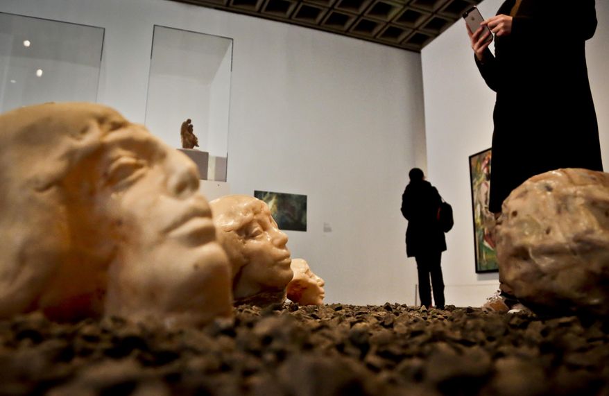 Unfinished marble sculptures from French sculptor Auguste Rodin is unveiled, during a press preview for the inaugural programming of The Met Breuer museum, Tuesday, March 1, 2016, in New York. The Metropolitan Museum of Art throws open the doors March 18, 2016 to its new modern and contemporary art outpost, The Met Breuer. The new space is a short walk from the Met's Fifth Avenue headquarters. It's housed at the Marcel Breuer-designed building that was the longtime home of the Whitney Museum of American Art before it moved downtown last year. (AP Photo/Bebeto Matthews)