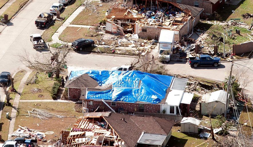 This aerial photo taken on Feb. 24, 2016, shows damage caused by a tornado that swept the area the day before in LaPlace, La.  A sense of normalcy is returning to St. John the Baptist Parish after a tornado struck the west side of LaPlace last week and damaged more than 500 buildings but remarkably left no one seriously injured. (John McCusker/The Advocate via AP)   MAGS OUT; INTERNET OUT; NO SALES; TV OUT; NO FORNS; LOUISIANA BUSINESS INC. OUT (INCLUDING GREATER BATON ROUGE BUSINESS REPORT, 225, 10/12, INREGISTER, LBI CUSTOM); MANDATORY CREDIT
