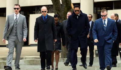 Three of six Baltimore city officers charged in connection to the death of Freddie Gray, leave the Maryland Court of Appeals, which heard oral arguments in five cases related to the arrest and death of Gray.