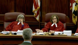 In this file photo, Court of Appeals of Maryland Chief Judge Mary Ellen Barbera (right) is shown questioning an attorney in a proceeding on March 1, 2018. (Associated Press photographs) **FILE**
