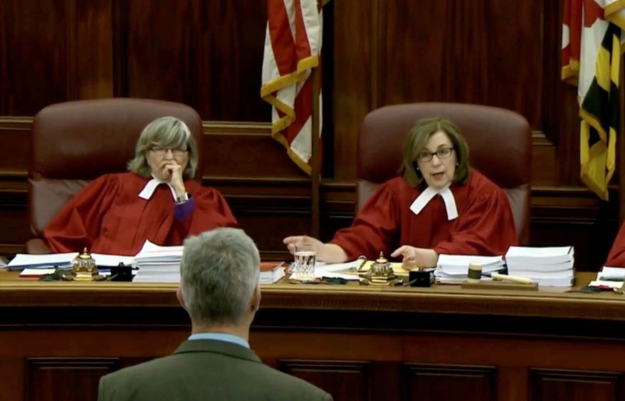 In this file photo, Court of Appeals of Maryland Chief Judge Mary Ellen Barbera (right) is shown questioning an attorney in a proceeding on March 1, 2018. (Associated Press photographs) **FILE**