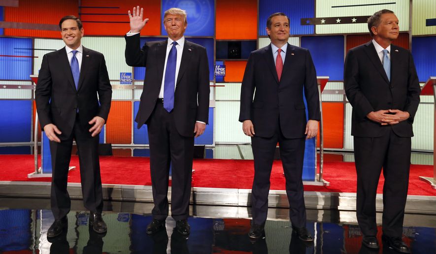 Republican presidential candidates Marco Rubio, Donald Trump, Ted Cruz and John Kasich take the stage before the Republican debate Thursday in Detroit. (Associated Press)