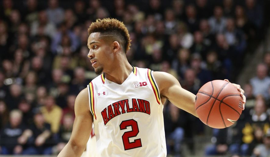 Maryland guard Melo Trimble controls the basketball against Purdue in the first half of an NCAA college basketball game, Saturday, Feb. 27, 2016, in West Lafayette, Ind. Purdue won 83-79.  (AP Photo/R Brent Smith)