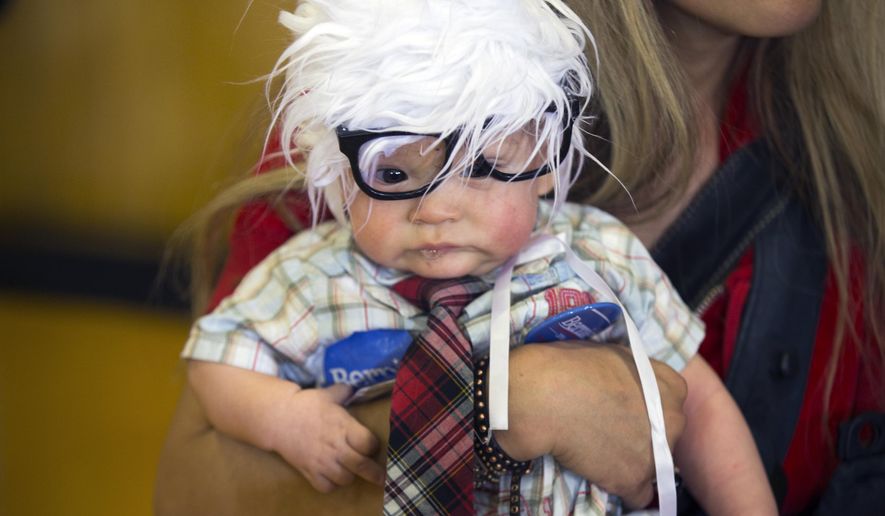 Oliver Jack Carter Lomas-Davis of Los Angeles died Feb. 25, his aunt Anastasia Lomas told The Associated Press. The winsome baby boy quickly became known across the Internet universe as Bernie Baby after his mother, Susan Lomas, posted photos on Facebook and Twitter of him greeting Sanders at a political rally in Las Vegas. (Associated Press)