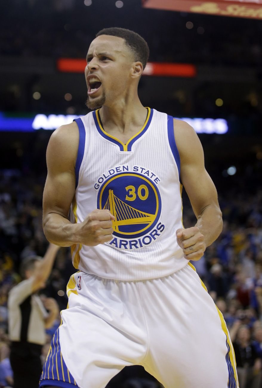 Golden State Warriors' Stephen Curry (30) celebrates after scoring during the second half of an NBA basketball game against the Oklahoma City Thunder Thursday, March 3, 2016, in Oakland, Calif. Golden State won 121-106. (AP Photo/Marcio Jose Sanchez)