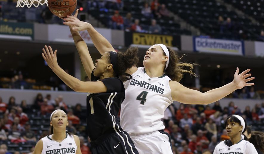 Michigan State center Jasmine Hines (4) fouls Purdue guard Ashley Morrissette (1) as she shoots in the second half of an NCAA college basketball game at the Big Ten Conference tournament in Indianapolis, Friday, March 4, 2016. Michigan State defeated Purdue 65-64. (AP Photo/Michael Conroy)