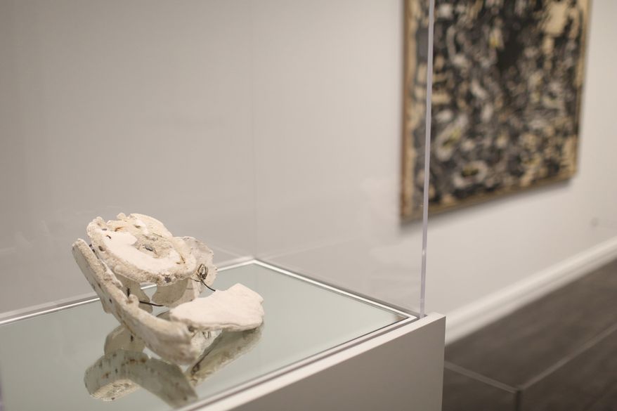 This March 1, 2016 photo provided by The Dallas Museum of Art shows a 1956 untitled Jackson Pollock sculpture made of plaster, sand, gauze, and wire. The Dallas Museum of Art has acquired a sculpture by Jackson Pollock, one of only six still in existence. The abstract sculpture is currently on display as part of the exhibit, titled “Jackson Pollock: Blind Spots.†The exhibit opened in November, 2015. It’s on view through March 20, 2016. (Gregory Castillo/Dallas Museum of Art via AP)