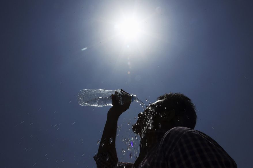 Climate change activists are taking some heat of their own after what has been called a "clear conspiracy" to hide records from the public at George Mason University. (Associated Press) **FILE**