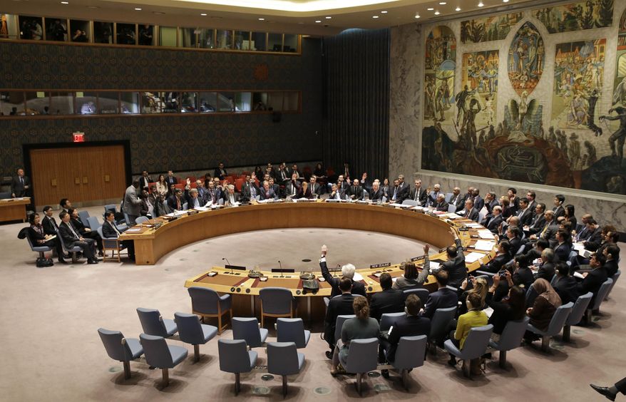 FILE - In this Wednesday, March 2, 2016, file photo, the United Nations Security Council votes on a resolution that would impose the toughest sanctions on North Korea in two decades, during a meeting at U.N. headquarters. After the North’s Jan. 6 nuclear test, Beijing joined the U.S. in imposing tougher sanctions that were approved unanimously Wednesday by the U.N. Security Council. But it insisted sanctions alone will never solve the nuclear issue. Instead, Chinese Foreign Minister Wang Yi suggested a “parallel track” approach that separates nuclear talks from negotiations to replace the more-than-60-year-old Korean War armistice with a peace agreement. (AP Photo/Seth Wenig, File)