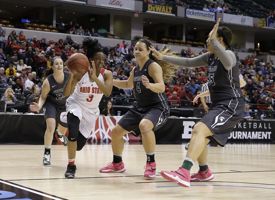 Ohio State&#39;s Kelsey Mitchell (3) makes a pass during the first half of an NCAA college basketball game against Michigan State at the Big Ten Conference tournament Saturday, March 5, 2016, in Indianapolis. (AP Photo/Darron Cummings)