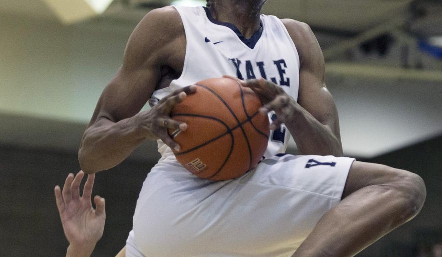 Yale forward Justin Sears (22) shoots lays up the ball in the first half of an NCAA Ivy League Conference college basketball game against Columbia, Saturday, March 5, 2016, in New York. (AP Photo/Bryan R. Smith)
