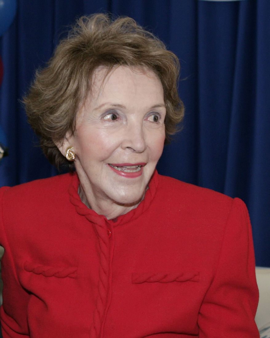 Former first lady Nancy Reagan is photographed before a retrospective honoring the 40th anniversary of her late husband, former president Ronald Reagan&#39;s California gubernatorial election, Monday, Oct. 30, 2006, at The Ronald Reagan Presidential Library in Simi Valley, Calif. (AP Photo/Matt Sayles)