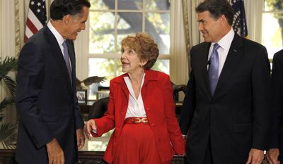 Republican presidential candidates former Massachusetts Gov. Mitt Romney, left, and Texas Gov. Rick Perry, right, meet with former first lady Nancy Reagan before a Republican presidential candidate debate at the Reagan Library Wednesday, Sept. 7, 2011, in Simi Valley, Calif.  (AP Photo/Chris Carlson, Pool)