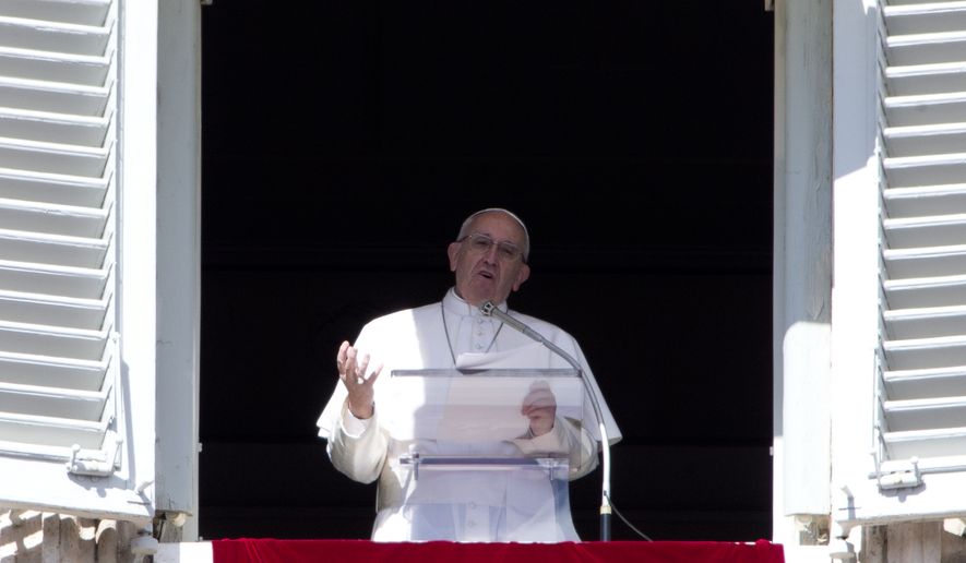 Pope Francis celebrates the Angelus noon prayer from the window of his studio overlooking St. Peter's Square, at the Vatican, Sunday, March 6, 2016. The pontiff said the four nuns killed Friday in an attack on a home for the elderly in Yemen are modern-day martyrs and victims of indifference. (AP Photo/Andrew Medichini)