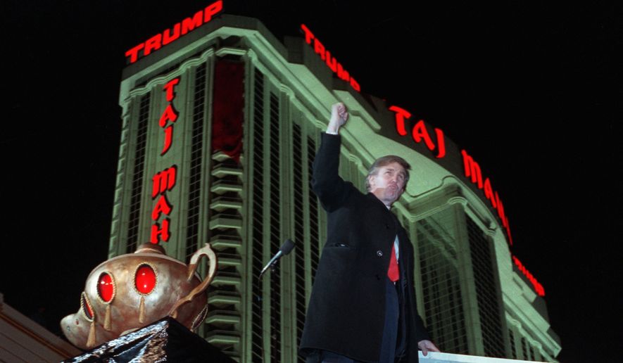 Back in the summer of 1990, Donald Trump was hustling to keep the Taj Mahal afloat and juggling roughly $3 billion in debt to banks and junk bond holders. (Associated Press)