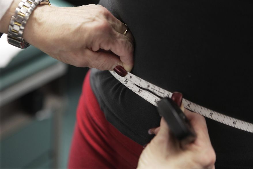 Fasters lost weight because they were cutting calories overall, researchers said, but the diet method had a higher dropout rate. (Associated Press/File)