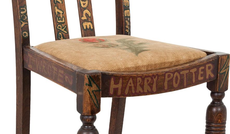 This undated photo provided by Heritage Auctions shows the chair that J.K. Rowling sat on while writing the first two books of the Harry Potter series. The chair, one of four old chairs a friend gave the starving artist when she began writing “Harry Potter and The Sorcerer’s Stone” in 1995, is going on the auction block in New York City on April 6 with an opening bid of $45,000. (Heritage Auctions, Joseph Schroeder via AP)