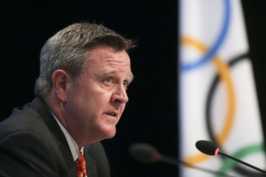 FILE - In this May 24, 2012, file photo, Scott Blackmun discusses an agreement between the International Olympic Committee and the U.S. Olympic Committee at the SportAccord conference in Quebec City. Once they get to the Olympics in Rio de Janeiro, American athletes could be faced with virus-spreading mosquitoes, virus-infested water and the prospect of competing against at least two countries, Russia and Kenya, that are under investigation for top-to-bottom doping conspiracies. (Francis Vachon/The Canadian Press via AP, File)