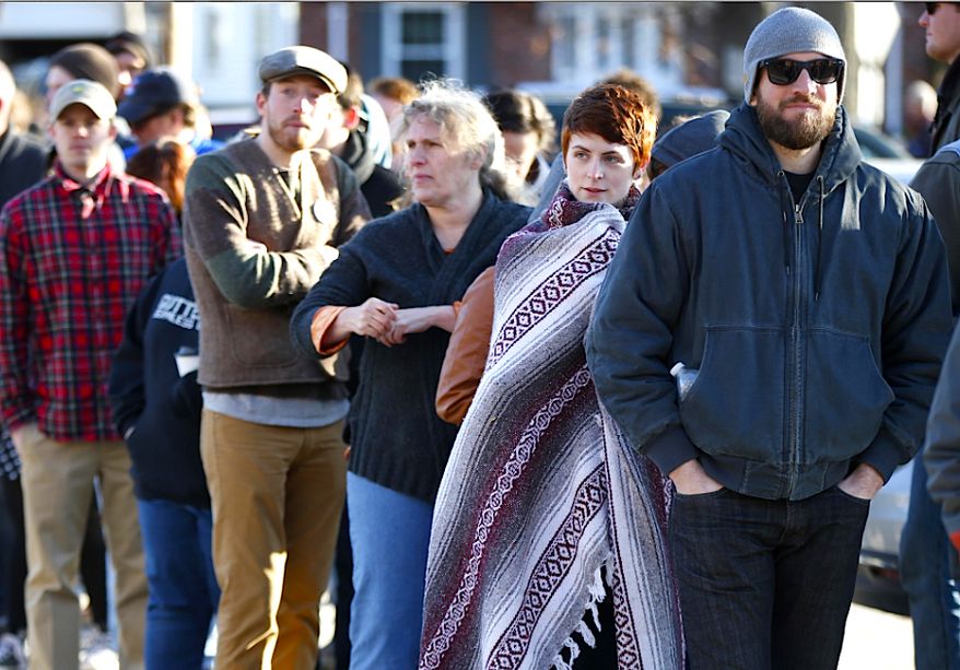 Democratic primary voters line up outside a polling place in Portland, Maine. (AP Photo/Robert F. Bukaty) ** FILE **

