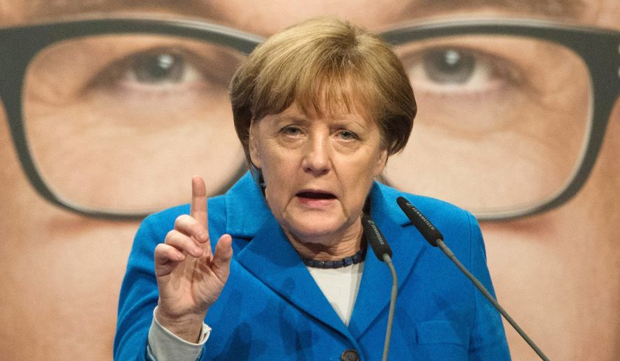 German Chancellor Angela Merkel refuses to limit the number of refugees her country will allow, causing a shake-up in her party. (Associated Press)
