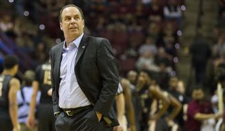 Notre Dame head coach Mike Brey watches in the first half of an NCAA college basketball game against Florida State in Tallahassee, Fla., Saturday, Feb. 27, 2016. (AP Photo/Mark Wallheiser)