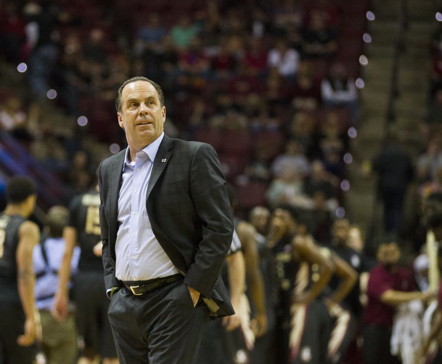 Notre Dame head coach Mike Brey watches in the first half of an NCAA college basketball game against Florida State in Tallahassee, Fla., Saturday, Feb. 27, 2016. (AP Photo/Mark Wallheiser)