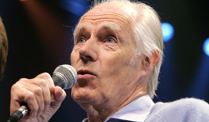 Beatles producer Sir George Martin answers a question from the media after the sneak preview of a new Beatles-themed Cirque du Soleil show, &amp;quot;Love,&amp;quot; in Las Vegas, in this Wednesday, May 24, 2006, file photo. (AP Photo/Jae C. Hong, File)