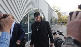 Hulk Hogan, whose given name is Terry Bollea, arrives at court Tuesday, March 8, 2016, in his case against the news website Gawker at the Pinellas County Courthouse, in St. Petersburg, Fla. (John Pendygraft/Tampa Bay Times via AP)