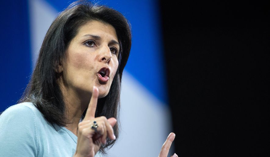 FILE - In this Jan. 9, 2016 file photo, South Carolina Gov. Nikki Haley speaks to the crowd at the Kemp Forum in Columbia, S.C. Haley and South Carolina’s military boosters want to end taxes on military retirement benefits. Haley’s budget calls for slicing $10 million from the state’s coffers to pay for the cut. The plan would ultimately cost the state $33 million every year.(AP Photo/Sean Rayford, File)