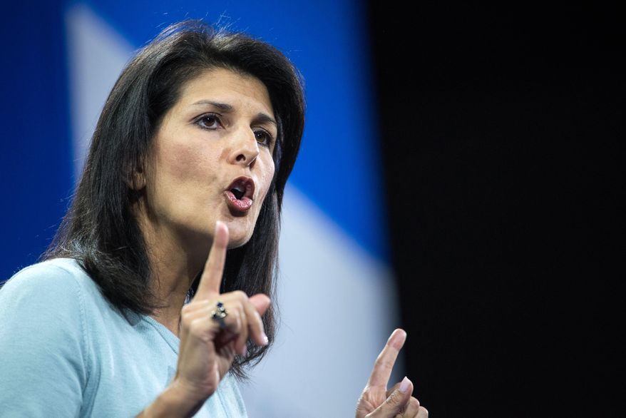 FILE - In this Jan. 9, 2016 file photo, South Carolina Gov. Nikki Haley speaks to the crowd at the Kemp Forum in Columbia, S.C. Haley and South Carolina’s military boosters want to end taxes on military retirement benefits. Haley’s budget calls for slicing $10 million from the state’s coffers to pay for the cut. The plan would ultimately cost the state $33 million every year.(AP Photo/Sean Rayford, File)