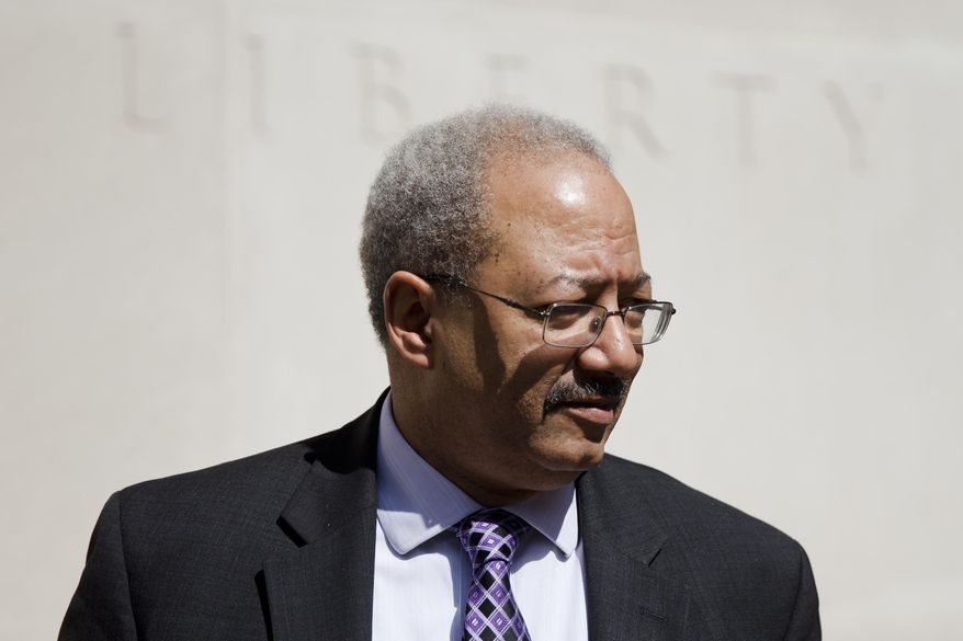 U.S. Rep. Chaka Fattah, D-Pa., walks from the federal courthouse Friday, March 11, 2016, in Philadelphia. New lawyers for the indicted Pennsylvania congressman say they won't try to delay the May 2 trial if they lose their bid to have the corruption case dismissed. The 11-term Philadelphia Democrat is accused of accepting bribes and misusing campaign funds and charitable grants to enrich his family and friends. (AP Photo/Matt Rourke)