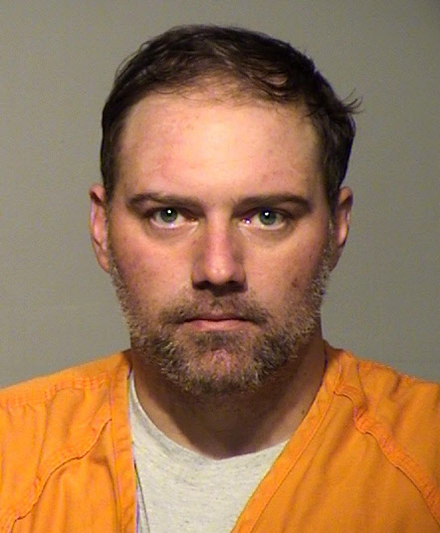This undated photo provided by the Milwaukee County Sheriff's Office shows Dan Popp, 39. Popp was charged Thursday March 10, 2016, with three counts of first-degree intentional homicide in the deaths of 40-year-old Jesus Manso-Perez, 36-year-old Phia Vue and 32-year-old Mai Vue, who were fatally shot Sunday in Milwaukee. Popp is also charged with attempted first-degree intentional homicide after authorities say he shot at Manso-Perez's 18-year-old son. (Milwaukee County Sheriff's Office via AP)