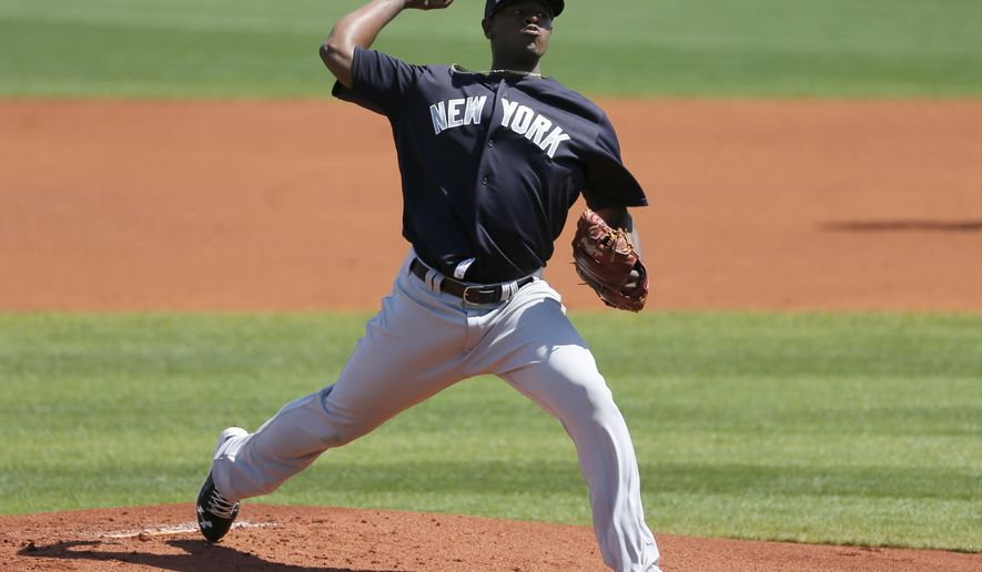 New York Yankees starting pitcher Luis Severino works against the Tampa Ba Rays in the first inning of spring training baseball game, Saturday, March 12, 2016, in Port Charlotte, Fla. (AP Photo/Tony Gutierrez)