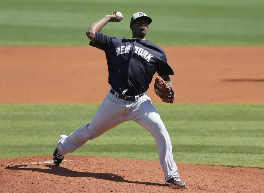 New York Yankees starting pitcher Luis Severino works against the Tampa Ba Rays in the first inning of spring training baseball game, Saturday, March 12, 2016, in Port Charlotte, Fla. (AP Photo/Tony Gutierrez)