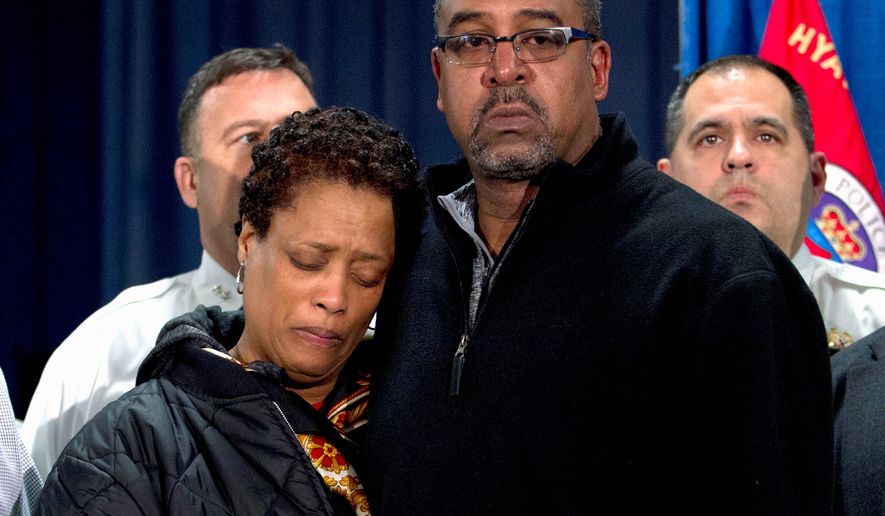 James and Sheila Colson, parents of Prince George's County Police Officer Jacai Colson, attend a news conference at police headquarters in Hyattsville, Md., on March 14, 2016. Colson, a four-year veteran of the force, was fatally shot outside the District III police station by his own colleagues as he responded to an attack on his police station by a gunman with a death wish, their police chief said. (Associated Press) **FILE**