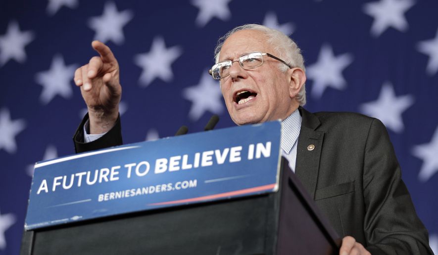 Democratic presidential candidate, Sen. Bernie Sanders, I-Vt., gestures as he speaks during a rally in Charlotte, N.C., Monday, March 14, 2016. (AP Photo/Chuck Burton)