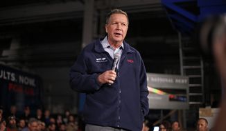 Republican presidential candidate, former Ohio Gov. John Kasich, attends a town hall meeting at Brilex Industries in Youngstown, Ohio, Monday, March 14, 2016.  (AP Photo/Gene J. Puskar)