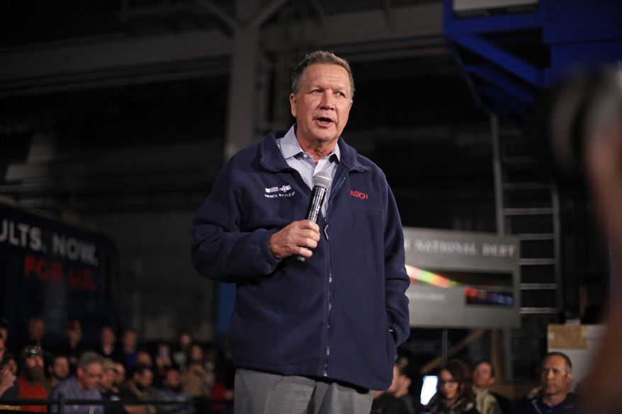 Republican presidential candidate, former Ohio Gov. John Kasich, attends a town hall meeting at Brilex Industries in Youngstown, Ohio, Monday, March 14, 2016. (AP Photo/Gene J. Puskar)
