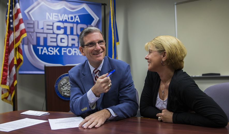 U.S. Rep. Joe Heck, R-Nev., with his wife Lisa, files to run for the Senate seat of outgoing U.S. Senator Harry Reid at the Grant Sawyer Building Monday, March 14, 2016 in Las Vegas. “All in all, people just want to know you have their concerns in mind,” said Heck. (Benjamin Hager/Las Vegas Review-Journal via AP)