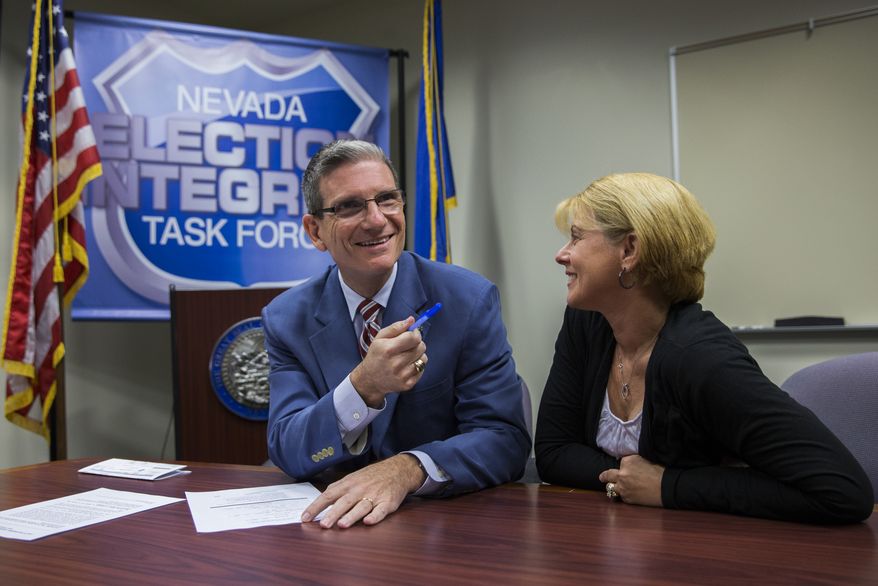 U.S. Rep. Joe Heck, R-Nev., with his wife Lisa, files to run for the Senate seat of outgoing U.S. Senator Harry Reid at the Grant Sawyer Building Monday, March 14, 2016 in Las Vegas. “All in all, people just want to know you have their concerns in mind,” said Heck. (Benjamin Hager/Las Vegas Review-Journal via AP)