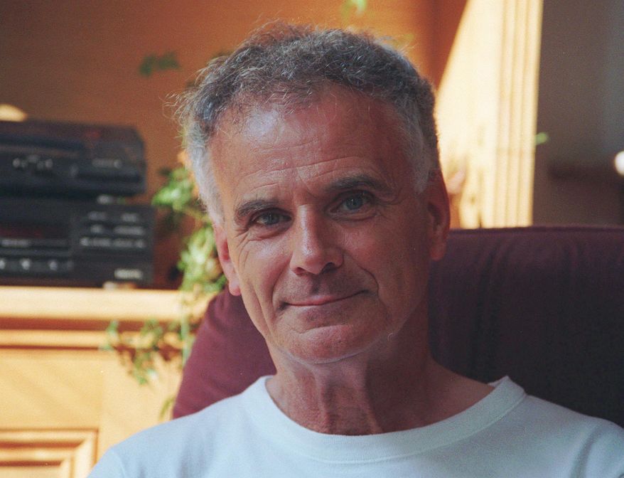 FILE - This is a June 19, 1996 file photo of composer Sir Peter Maxwell Davies posing for a photograph in London. Maxwell Davies, who served as Queen Elizabeth II's official master of music, has died at 81. Davies' management company, Intermusica, says he died Monday March 14, 2016 of leukemia at his home in Scotland's Orkney islands. One of Britain's best-known modern composers, Davies created some 300 works including symphonies, the operas "Taverner" and "The Lighthouse," and "Eight Songs for a Mad King," about the current queen's troubled ancestor, George III. (AP Photo, File)