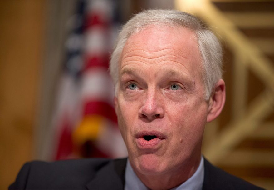 Sen. Ron Johnson said a San Bernardino conspirator was prevented from being confronted by armed agents by immigration authorities. (Associated Press)