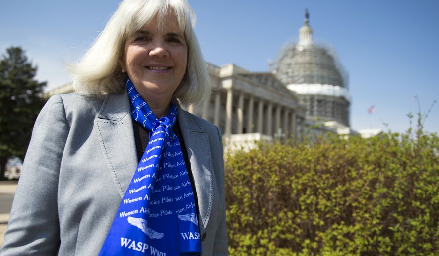 Terry Harmon, daughter of WWII veteran WASP (Women Airforce Service Pilots), Elaine Harmon, speaks to reporters after an event with members of congress on the reinstatement of WWII female pilots at Arlington National Cemetery on Capitol Hill in Washington, Wednesday, March 16, 2016. Arlington National Cemetery approved in 2002 active duty designees, including WASP pilots, for military honors and inurnments. However, in March 2015, then-Secretary of the Army John McHugh reversed this decision. (AP Photo/Molly Riley)