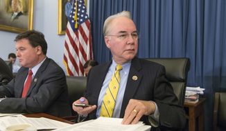 House Budget Committee Chairman Tom Price, R-Ga., joined at left by Vice-Chairman Todd Rokita, R-Ind., presides over a markup session as the panel presses ahead with a 10-year balanced budget plan that cuts federal health care programs and agency budgets. (AP Photo/J. Scott Applewhite)