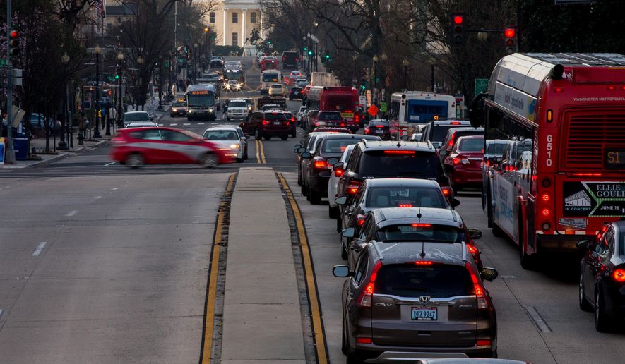 The White House is visible as morning traffic builds along 16th Street Northwest, in Washington, Wednesday, March 16, 2016. The Metro subway system that serves the nation&#x27;s capital and its Virginia and Maryland suburbs shut down for a full-day for an emergency safety inspection of its third-rail power cables. Making for unusual commute, as the lack of service is forcing some people on the roads, while others are staying home or teleworking. (AP Photo/Andrew Harnik)