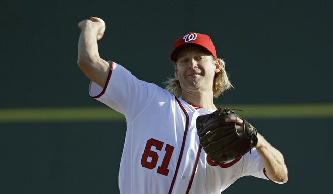Washington Nationals&#x27; Bronson Arroyo pitches against the Houston Astros in the first inning of a spring training baseball game, Thursday, March 10, 2016, in Viera, Fla. (AP Photo/John Raoux)