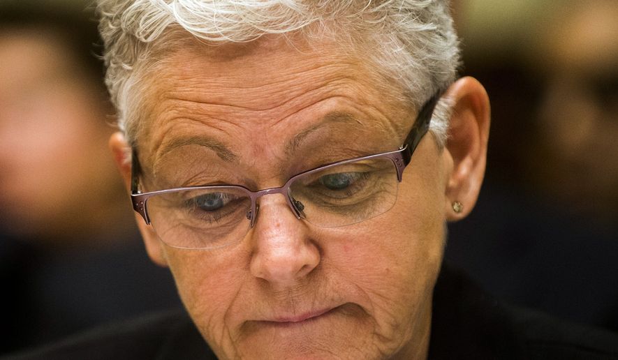 Environmental Protection Agency Administrator Gina McCarthy listens during a hearing about the Flint water crisis in front of the U.S. House Committee on Government Oversight and Reform at the Rayburn House Office Building on Thursday, March 17, 2016 in Washington. Michigan Gov. Rick Snyder on Thursday blamed career bureaucrats in Washington and his own state for the Flint water-contamination crisis, while the head of the federal Environmental Protection Agency faulted him and other state officials. (Jake May/The Flint Journal-MLive.com via AP)