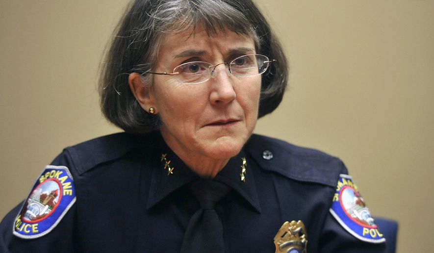 In this Jan. 19, 2011 photo, Spokane Police Chief Anne Kirkpatrick speaks at news conference in Spokane, Wash. The Chicago Police Board on Thursday, March 17, 2016, named Kirkpatrick as one of three contenders to become the city's police chief to replace superintendent Garry McCarthy who was fired in December. (Dan Pelle/The Spokesman-Review via AP) COEUR D'ALENE PRESS OUT; MANDATORY CREDIT