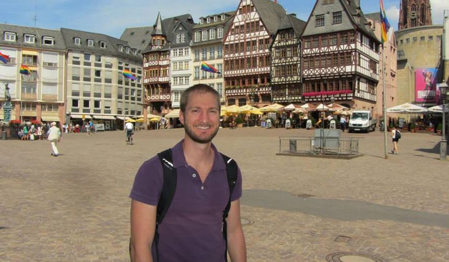 In this undated photo released by Carolyn Novak, Matthew Novak, 31, a native of Kansas City, Missouri poses for a photo. Mr. Novak was stopped Saturday at Abu Dhabi International Airport during a layover while traveling from Thailand to Egypt, his mother said. (Carolyn Novak via AP)